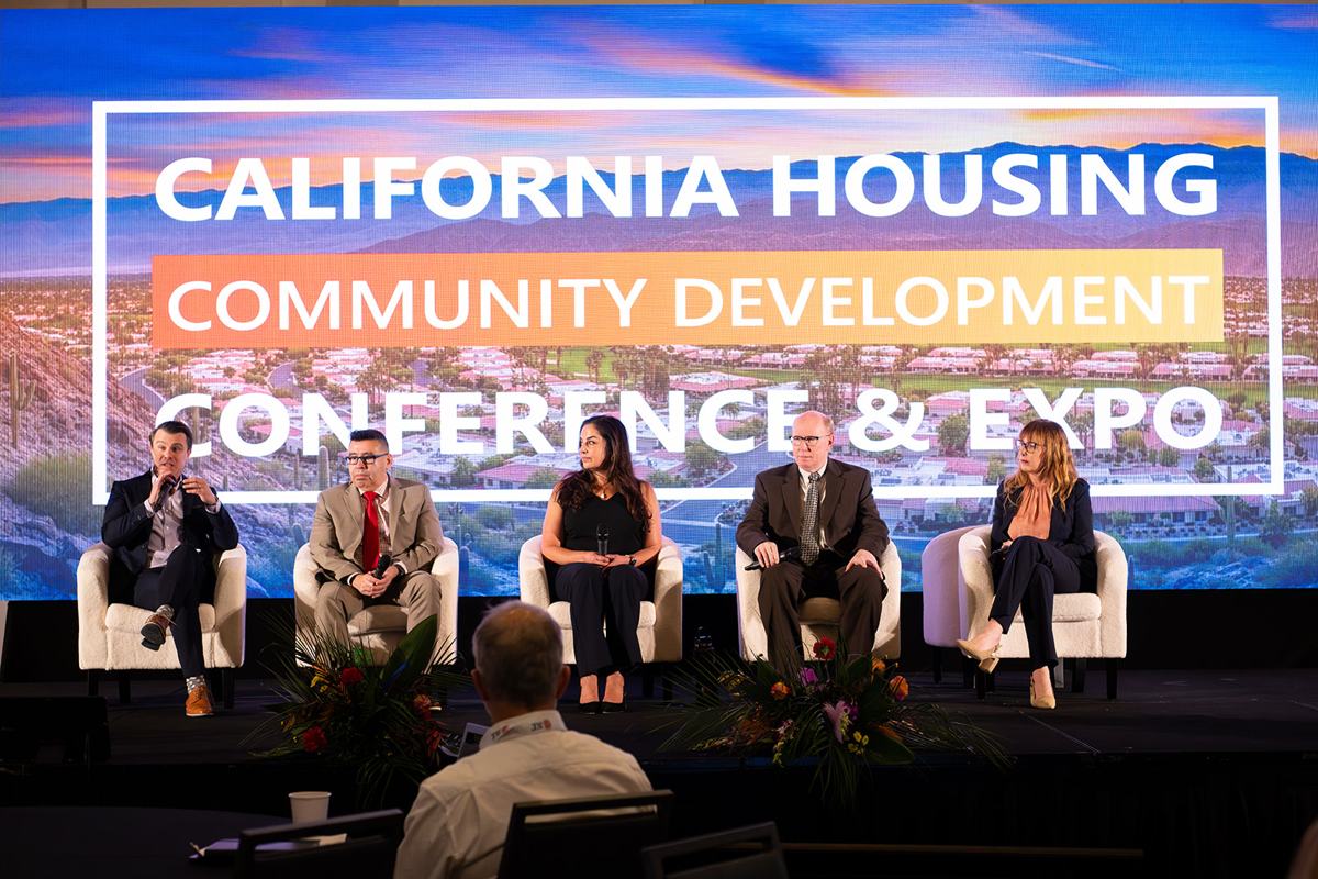 A full ballroom during a main stage session at the 2025 California Housing & Community Development Conference